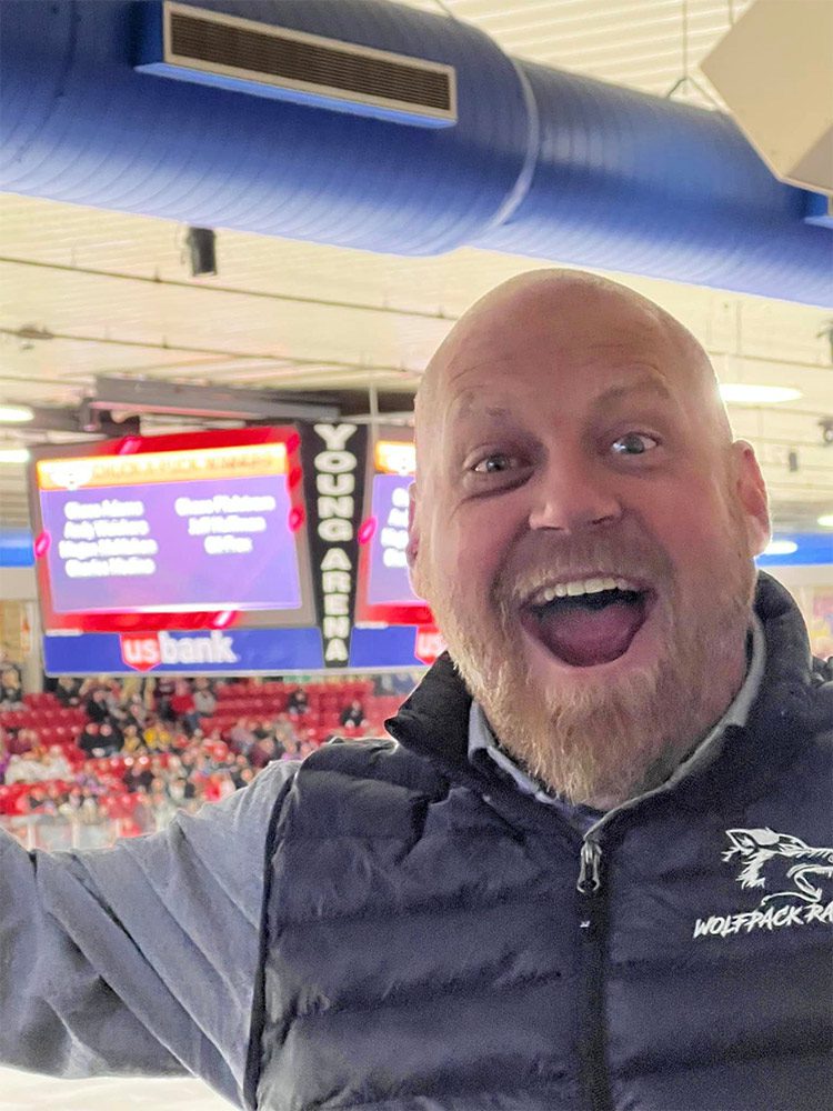 The Single Speed Suite at Young Arena was the perfect spot to watch the Waterloo Black Hawks get a win! Andy Smiling after winning chuck a puck